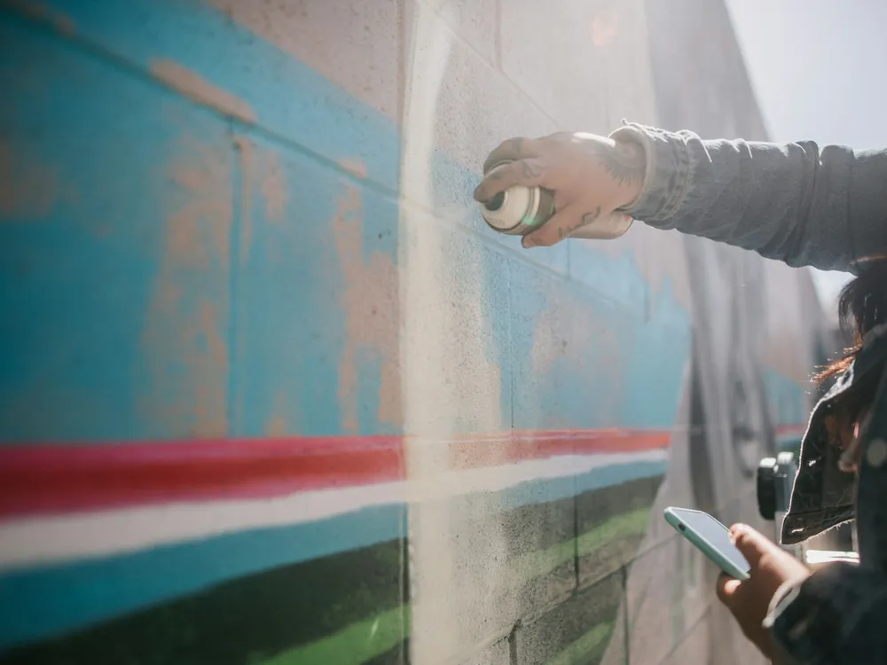 A panel being spray painted