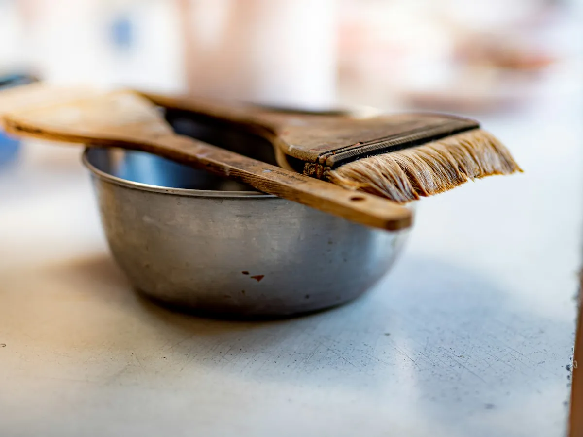 A hair colour bowl and brush