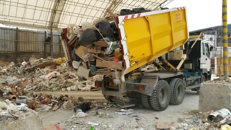 A truck loaded with debris