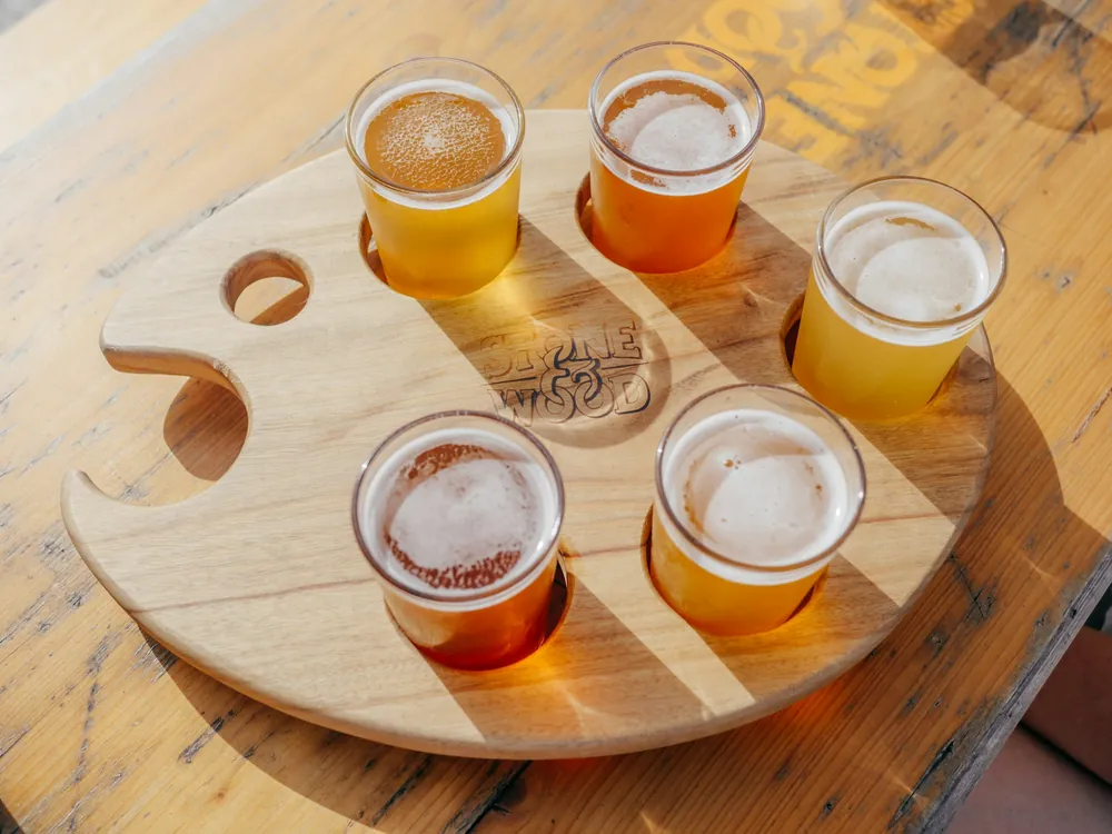 A tasting flight on a round board