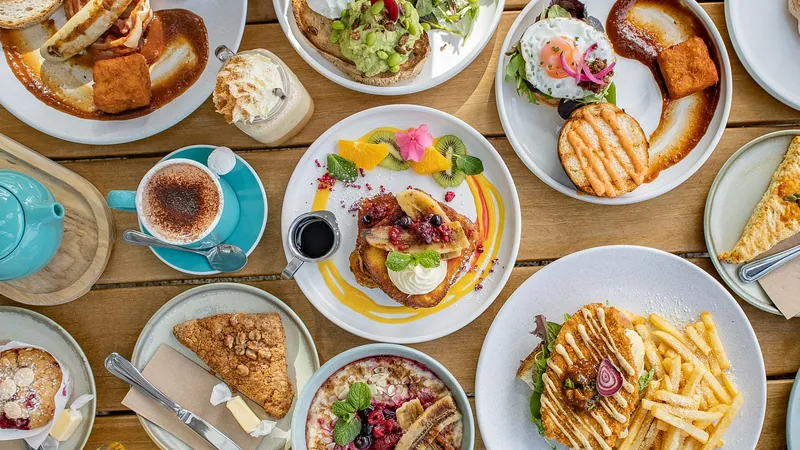 A brunch table with many plates