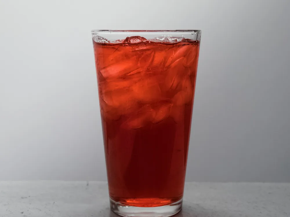 A glass of iced red tea