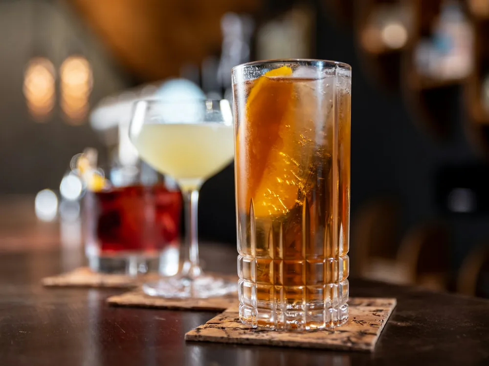 Two cocktails on a bar