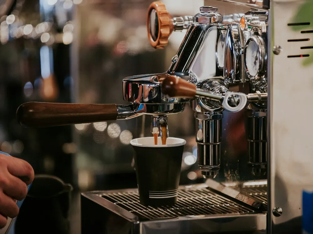 An espresso machine at work