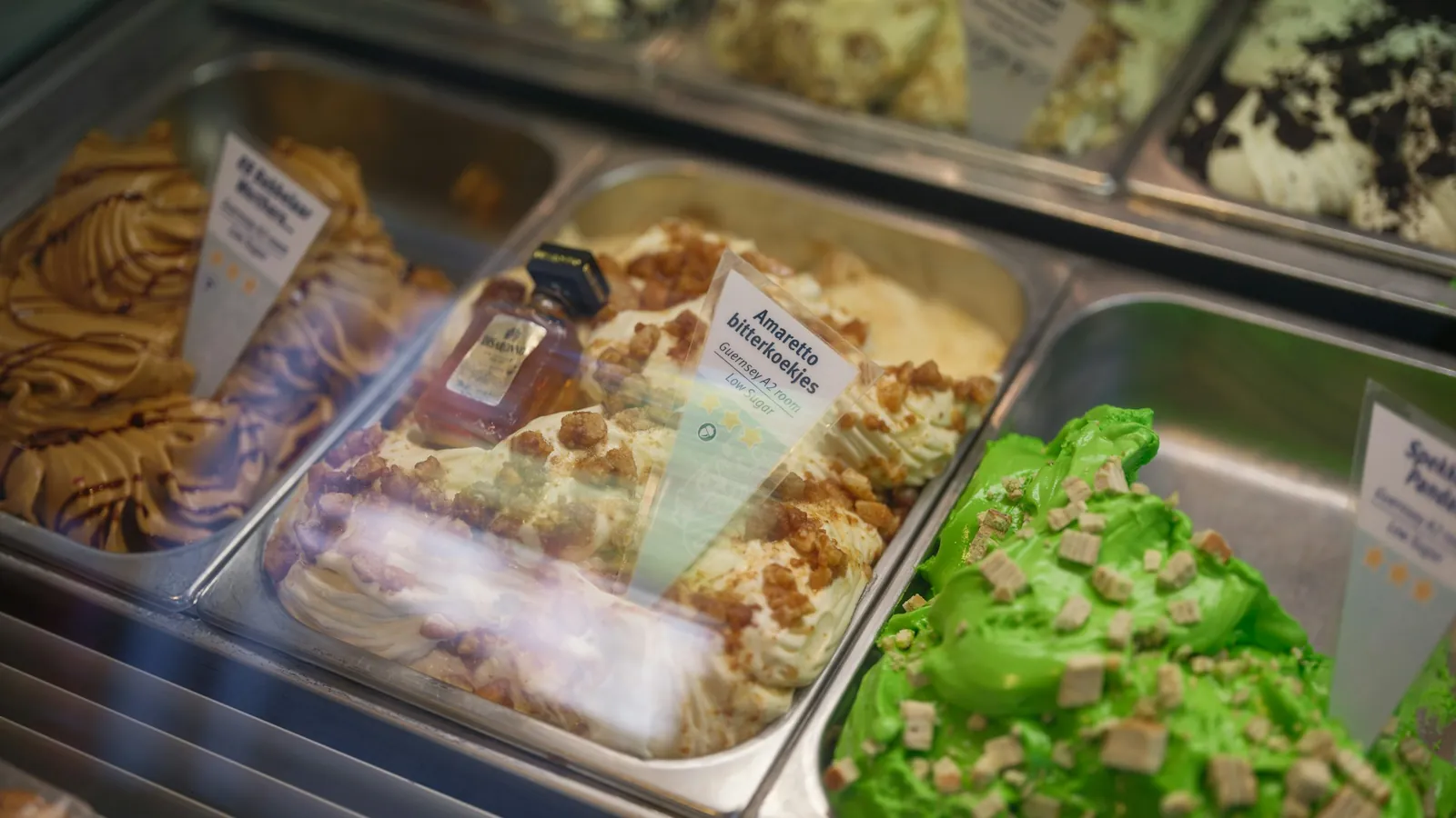 Gelato flavours in a display case