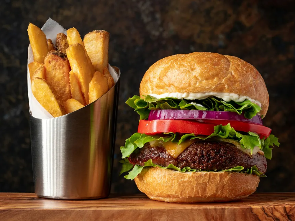 A burger with fries