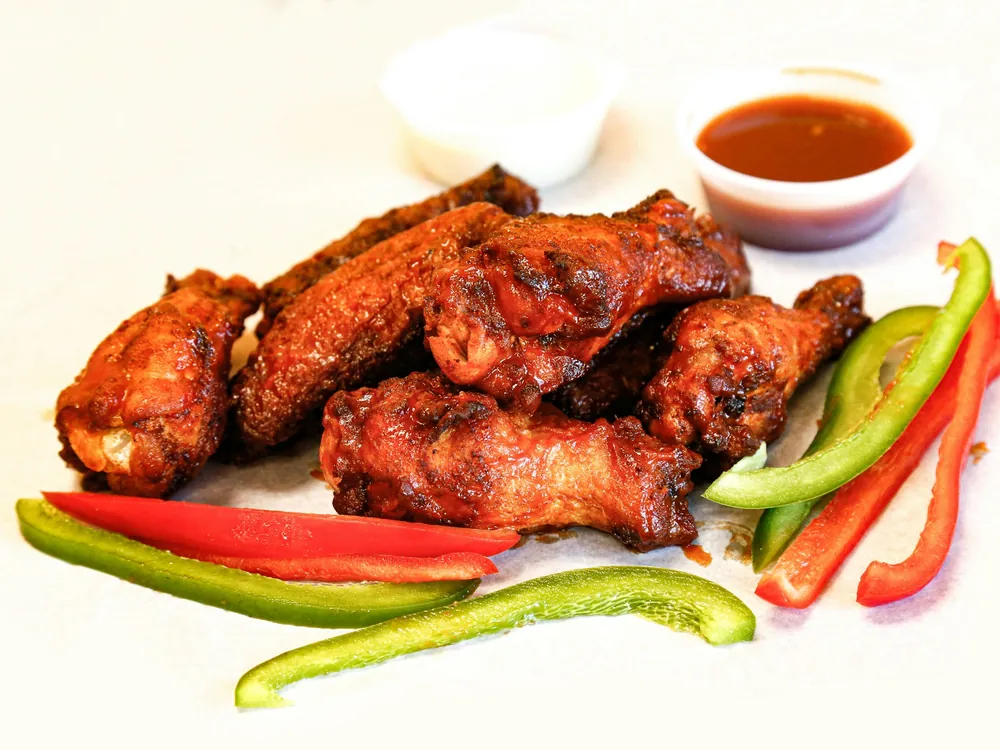 Chicken wings with celery and a dip