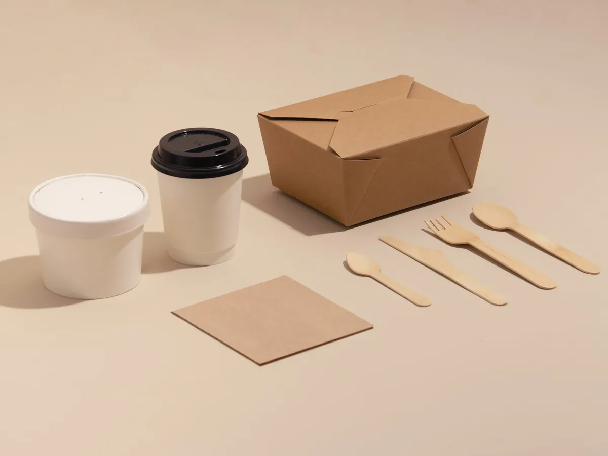 A takeout box and a paper cup