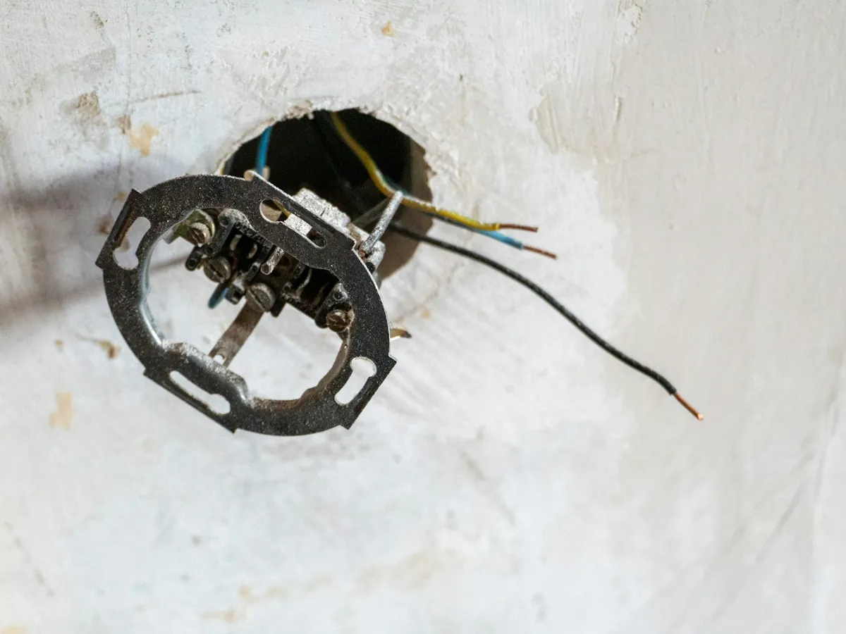 Wires in an open electrical box in a wall